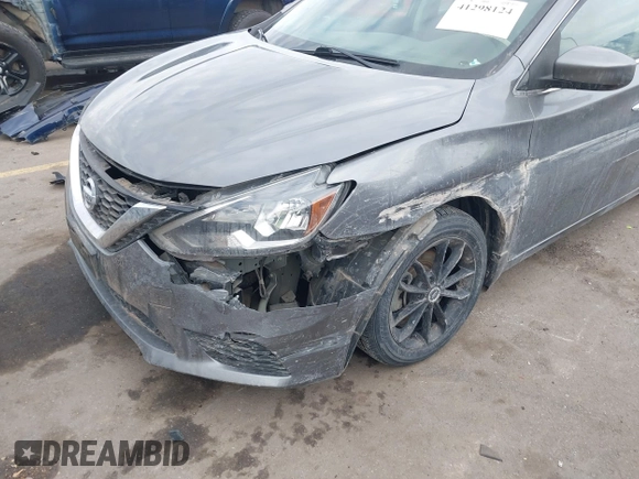 2019 Nissan Sentra S z VIN 3N1AB7AP4KY424604, wystawiony jako IAAI lot #41298124 z przebiegiem 73 000 mil mil oraz . Historia ofert i sprzedaży dostępna na DreamBid. Obrazek 5.