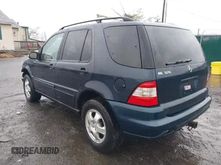 2003 Mercedes-Benz M-Class 3.2L with VIN 4JGAB54EX3A390987, listed as a IAAI auction lot 41482335 with 191,381 mi miles. Bid and sale history available at carsss.com. Image 3.