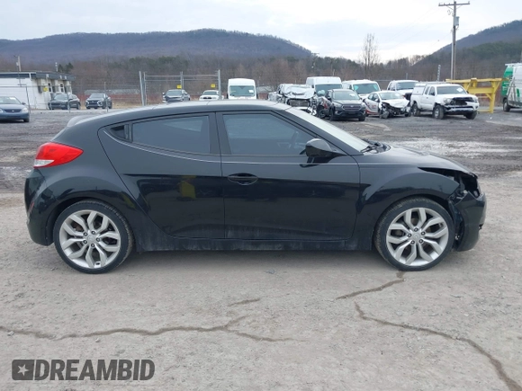 2012 Hyundai Veloster w/Black Int with VIN KMHTC6AD8CU066779, listed as a IAAI auction lot 41699960 with 160,875 mi miles and . Bid and sale history available at DreamBid. Image 14.