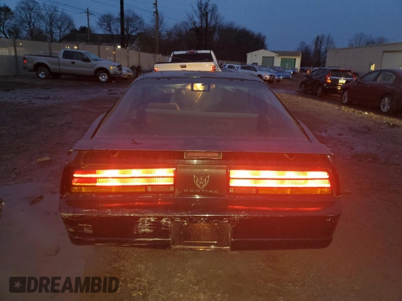 1990 Pontiac Firebird with VIN 1G2FS23TXLL205077, listed as a Copart auction lot 44035705 with 142,809 mi miles and Salvage title. Bid and sale history available at DreamBid. Image 6.