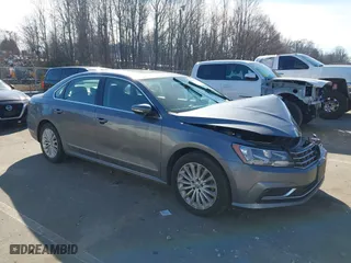 2017 Volkswagen Passat 1.8T SE with VIN 1VWBT7A36HC055030, listed as a IAAI auction lot 41668054 with 156,046 mi miles. Bid and sale history available at carsss.com. Image 1.