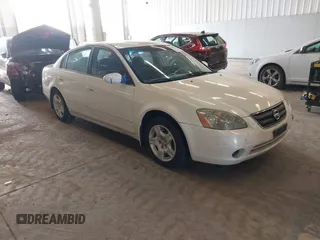 2002 Nissan Altima SL z VIN 1N4AL11E52C276774, wystawiony jako IAAI lot #41993871 z przebiegiem 108 390 mil mil oraz . Historia ofert i sprzedaży dostępna na DreamBid. Obrazek 1.