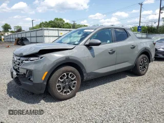 2024 Hyundai Santa Cruz SEL with VIN 5NTJBDAE4RH097088, listed as a Copart auction lot 61452945 with 26,972 mi miles and Salvage title. Bid and sale history available at DreamBid. Image 1.