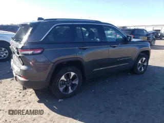 2023 Jeep Grand Cherokee 30th Anniversary z VIN 1C4RJYB64P8769262, wystawiony jako Copart lot #84694194 z przebiegiem 25 239 mil mil oraz Szkoda całkowita • Salvage title. Historia ofert i sprzedaży dostępna na DreamBid. Obrazek 3.