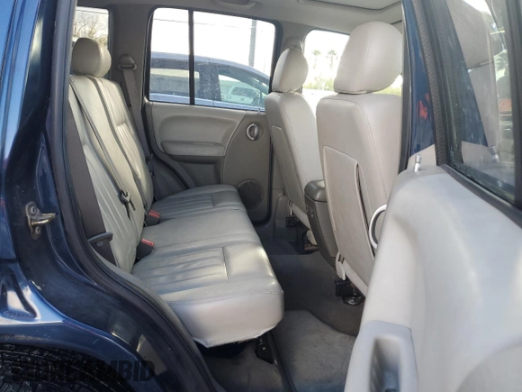 2005 Jeep Liberty Limited with VIN 1J4GK58K95W633445, listed as a Copart auction lot 86104754 with 149,972 mi miles and Salvage Title. Bid and sale history available at carsss.com. Image 11.