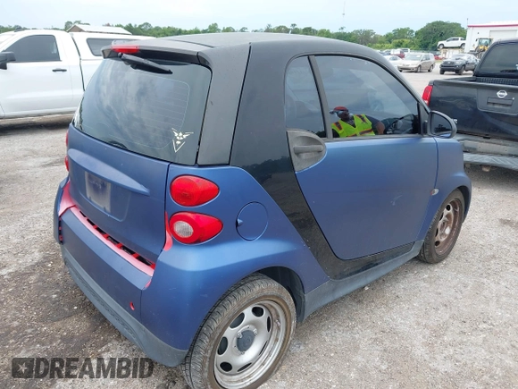 2013 Smart fortwo Pure with VIN WMEEJ3BA6DK664115, listed as a IAAI auction lot 42412198 with 64,522 mi miles and . Bid and sale history available at DreamBid. Image 4.