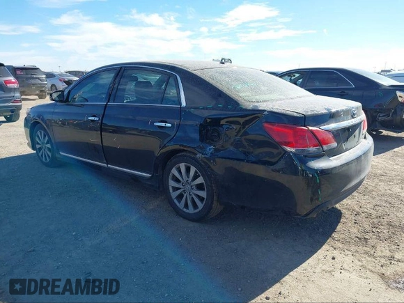 2012 Toyota Avalon with VIN 4T1BK3DB4CU442885, listed as a IAAI auction lot 40713053 with 144,383 mi miles and . Bid and sale history available at DreamBid. Image 3.