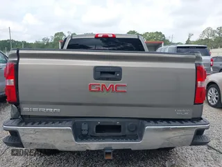 2017 GMC Sierra 1500 SLE z VIN 3GTP1MEC0HG230277, wystawiony jako IAAI lot #41997297 z przebiegiem Nie podano mil oraz . Historia ofert i sprzedaży dostępna na DreamBid. Obrazek 16.