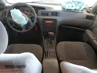 2001 Toyota Camry CE z VIN 4T1BG22K11U017054, wystawiony jako Copart lot #57623485 z przebiegiem 242 217 mil mil oraz Szkoda całkowita • Salvage title. Historia ofert i sprzedaży dostępna na DreamBid. Obrazek 8.