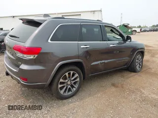 2017 Jeep Grand Cherokee Overland with VIN 1C4RJFCG6HC964435, listed as a IAAI auction lot 42407567 with 113,760 mi miles and . Bid and sale history available at DreamBid. Image 4.