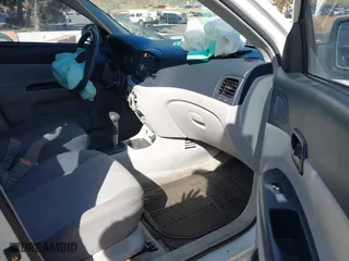2006 Hyundai Accent GLS with VIN KMHCN46C36U040545, listed as a IAAI auction lot 42021545 with 224,058 mi miles. Bid and sale history available at carsss.com. Image 5.