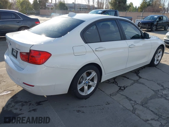 2013 BMW 3 Series 328i xDrive with VIN WBA3B5G54DNP40324, listed as a IAAI auction lot 41702014 with 126,932 mi miles. Bid and sale history available at carsss.com. Image 4.