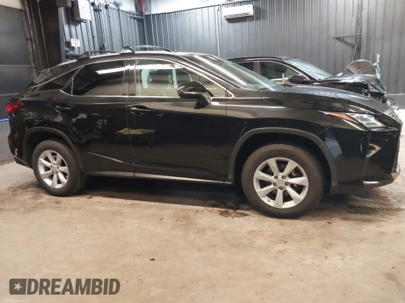 2016 Lexus RX 350 with VIN 2T2BZMCAXGC052189, listed as a IAAI auction lot 42568720 with 65,889 mi miles and . Bid and sale history available at DreamBid. Image 13.