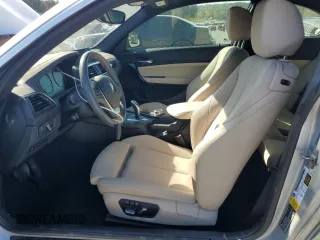 2020 BMW 2 Series 230i with VIN WBA2J1C06L7E79656, listed as a Copart auction lot 74909234 with 50,931 mi miles and Salvage Title. Bid and sale history available at carsss.com. Image 7.