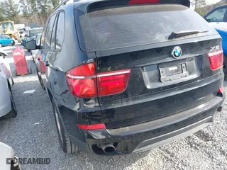 2011 BMW X5 35i with VIN 5UXZV4C58BL406373, listed as a IAAI auction lot 41715817 with 101,900 mi miles. Bid and sale history available at carsss.com. Image 3.