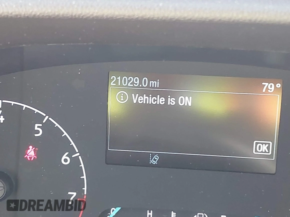 2023 Ford Transit Cargo with VIN 1FTYE1Y82PKA84762, listed as a IAAI auction lot 41718720 with 21,029 mi miles and . Bid and sale history available at DreamBid. Image 15.