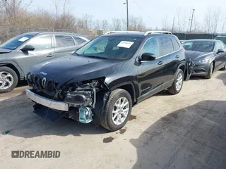 2015 Jeep Cherokee North with VIN 1C4PJMCS4FW792918, listed as a IAAI auction lot 41748651 with 107,034 mi miles. Bid and sale history available at carsss.com. Image 2.