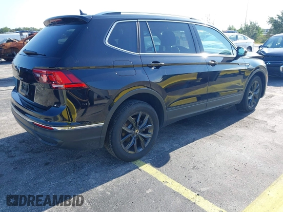2024 Volkswagen Tiguan SE with VIN 3VVNB7AXXRM199400, listed as a IAAI auction lot 42216941 with 11,581 mi miles and . Bid and sale history available at DreamBid. Image 4.