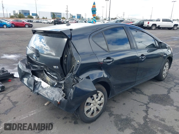 2014 Toyota Prius One with VIN JTDKDTB39E1071253, listed as a IAAI auction lot 41734442 with 233,895 mi miles and . Bid and sale history available at DreamBid. Image 4.