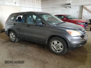 2011 Honda CR-V LX with VIN 5J6RE4H34BL058610, listed as a Copart auction lot 48737515 with 142,130 mi miles and Clean Title. Bid and sale history available at DreamBid. Image 4.