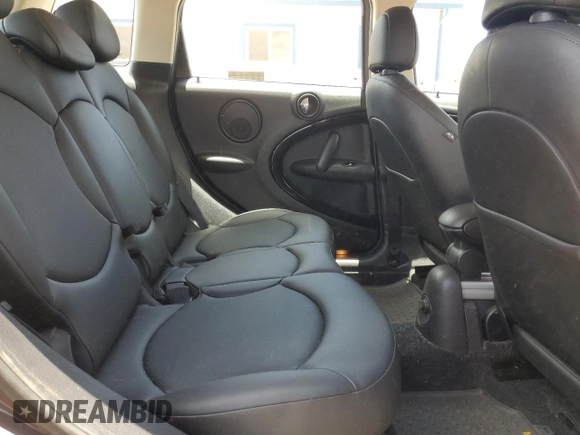 2012 MINI Countryman with VIN WMWZB3C59CWM04522, listed as a Copart auction lot 56605865 with 33,186 mi miles and Salvage title. Bid and sale history available at DreamBid. Image 11.