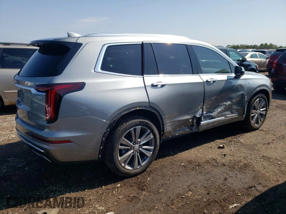 2024 Cadillac XT6 FWD Premium Luxury with VIN 1GYKPCRS7RZ736818, listed as a Copart auction lot 67768804 with 7,145 mi miles and Salvage Title. Bid and sale history available at carsss.com. Image 3.
