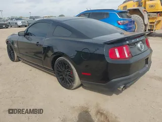 2010 Ford Mustang GT500 with VIN 1ZVBP8JS9A5130203, listed as a IAAI auction lot 42064720 with 32,461 mi miles. Bid and sale history available at carsss.com. Image 3.