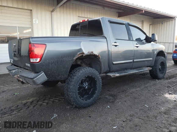 2004 Nissan Titan LE with VIN 1N6AA07A64N562975, listed as a Copart auction lot 85230234 with 99,973 mi miles and Salvage Title. Bid and sale history available at DreamBid. Image 3.