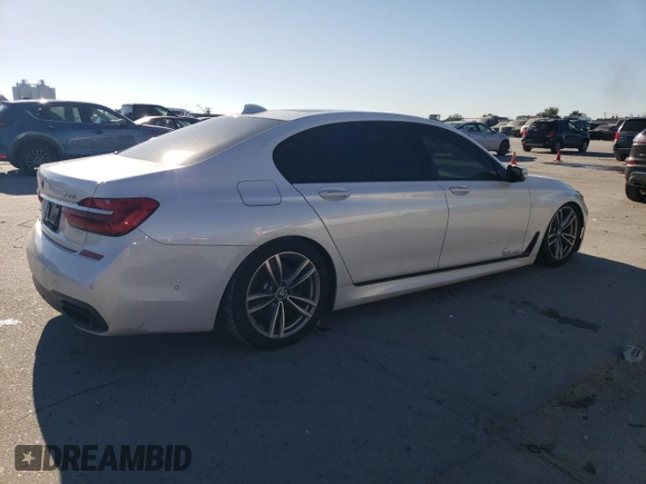 2017 BMW 7 Series 750i with VIN WBA7F0C52HGM21383, listed as a Copart auction lot 85540974 with 151,708 mi miles and Salvage title. Bid and sale history available at DreamBid. Image 3.