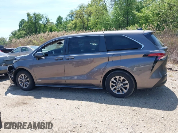 2021 Toyota Sienna LE with VIN 5TDKSKFC4MS004345, listed as a IAAI auction lot 42145140 with 103,544 mi miles and . Bid and sale history available at DreamBid. Image 14.