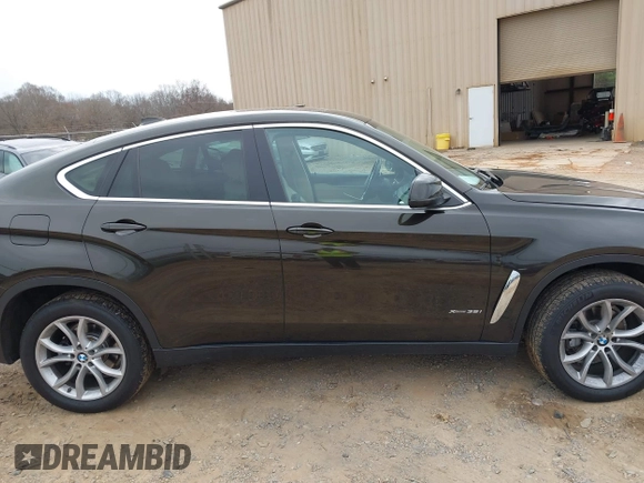 2015 BMW X6 xDrive35i z VIN 5UXKU2C56F0N76862, wystawiony jako IAAI lot #41747776 z przebiegiem 119 426 mil mil oraz . Historia ofert i sprzedaży dostępna na DreamBid. Obrazek 14.