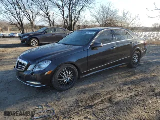 2011 Mercedes-Benz E-Class E 550 Luxury with VIN WDDHF9AB2BA264183, listed as a Copart auction lot 46336995 with 184,659 mi miles and Salvage Title. Bid and sale history available at carsss.com. Image 1.