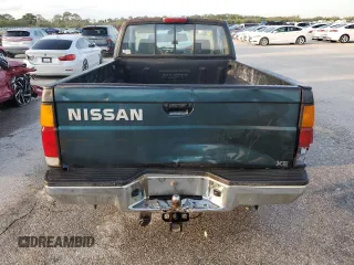 1994 Nissan Frontier XE z VIN 1N6SD16S1RC372743, wystawiony jako Copart lot #54486495 z przebiegiem 206 951 mil mil oraz Szkoda całkowita • Salvage title. Historia ofert i sprzedaży dostępna na DreamBid. Obrazek 6.