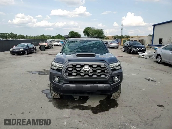 2020 Toyota Tacoma SR5 z VIN 3TYDZ5BN9LT000209, wystawiony jako Copart lot #56127875 z przebiegiem 92 350 mil mil oraz Szkoda całkowita • Salvage title. Historia ofert i sprzedaży dostępna na DreamBid. Obrazek 13.
