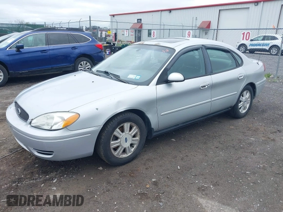 2005 Ford Taurus SEL z VIN 1FAFP56245A233415, wystawiony jako IAAI lot #42225619 z przebiegiem 145 658 mil mil oraz . Historia ofert i sprzedaży dostępna na DreamBid. Obrazek 2.