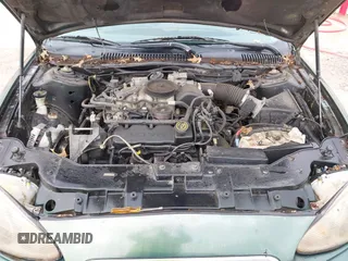 1999 Mercury Sable GS with VIN 1MEFM50U5XG633589, listed as a IAAI auction lot 41614442 with 241,833 mi miles. Bid and sale history available at carsss.com. Image 10.