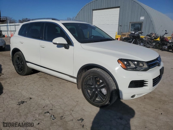 2012 Volkswagen Touareg Sport w/Nav with VIN WVGFK9BP7CD004977, listed as a Copart auction lot 82425314 with NaN miles and Clean Title. Bid and sale history available at carsss.com. Image 4.