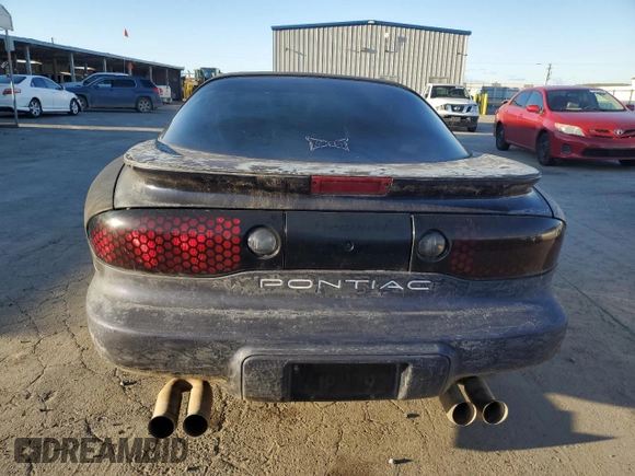 1999 Pontiac Firebird Firebird with VIN 2G2FS22KXX2216224, listed as a Copart auction lot 47316085 with Not provided miles and Clean title. Bid and sale history available at DreamBid. Image 6.