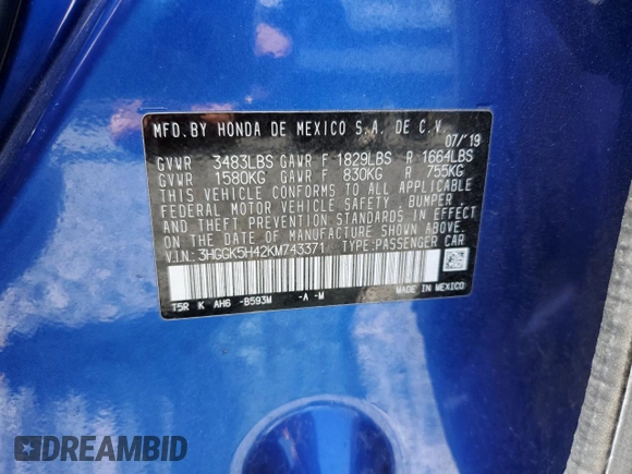 2019 Honda Fit LX z VIN 3HGGK5H42KM743371, wystawiony jako Copart lot #54473625 z przebiegiem 90 940 mil mil oraz Szkoda całkowita • Salvage title. Historia ofert i sprzedaży dostępna na DreamBid. Obrazek 13.