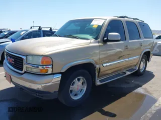 2001 GMC Yukon SLT with VIN 1GKEC13T71J113257, listed as a IAAI auction lot 41975910 with 195,509 mi miles. Bid and sale history available at carsss.com. Image 2.
