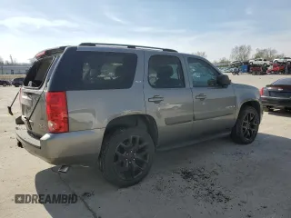 2007 GMC Yukon SLT with VIN 1GKFK13027J130960, listed as a Copart auction lot 49958035 with 0 mi miles and Salvage Title. Bid and sale history available at carsss.com. Image 3.