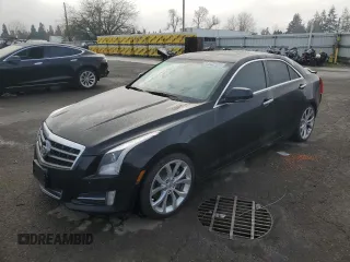 2014 Cadillac ATS Premium with VIN 1G6AE5SXXE0162905, listed as a Copart auction lot 84902594 with 146,010 mi miles and Salvage Title. Bid and sale history available at carsss.com. Image 1.