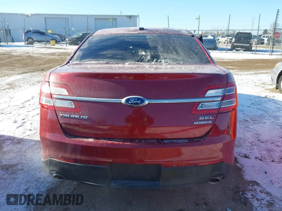 2015 Ford Taurus SEL z VIN 1FAHP2E85FG163421, wystawiony jako IAAI lot #41320489 z przebiegiem 165 618 mil mil oraz . Historia ofert i sprzedaży dostępna na DreamBid. Obrazek 16.