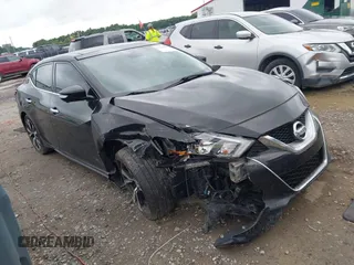 2016 Nissan Maxima SL with VIN 1N4AA6AP5GC413627, listed as a IAAI auction lot 42468940 with 209,558 mi miles and . Bid and sale history available at DreamBid. Image 1.
