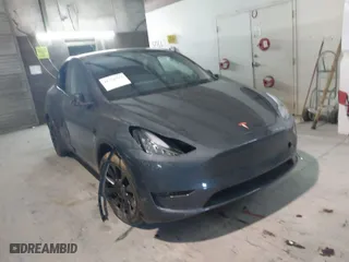 2023 Tesla Model Y Long Range with VIN 7SAYGDEE3PA034830, listed as a IAAI auction lot 41351397 with 26,704 mi miles. Bid and sale history available at carsss.com. Image 1.