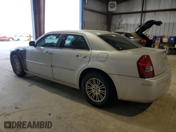 2010 Chrysler 300 Touring with VIN 2C3CA5CV8AH153855, listed as a Copart auction lot 49689075 with 223,059 mi miles and Salvage Title. Bid and sale history available at carsss.com. Image 2.