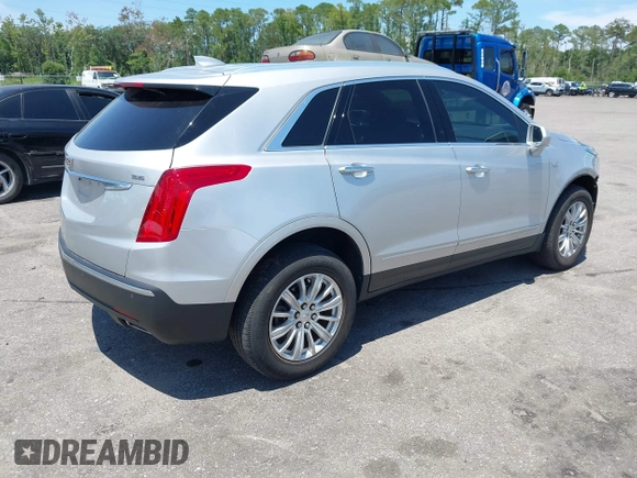2019 Cadillac XT5 FWD with VIN 1GYKNARS4KZ259863, listed as a IAAI auction lot 42603196 with 51,251 mi miles and . Bid and sale history available at DreamBid. Image 4.