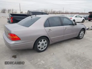 2001 Lexus LS 430 z VIN JTHBN30F210015017, wystawiony jako IAAI lot #41318606 z przebiegiem 173 409 mil mil oraz . Historia ofert i sprzedaży dostępna na DreamBid. Obrazek 4.