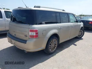 2018 Ford Flex SEL z VIN 2FMGK5C88JBA18829, wystawiony jako IAAI lot #42283656 z przebiegiem 138 165 mil mil oraz . Historia ofert i sprzedaży dostępna na DreamBid. Obrazek 4.