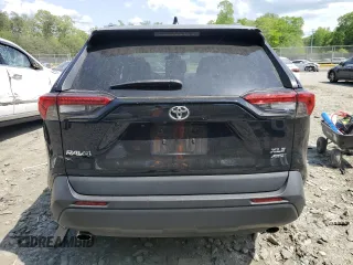 2021 Toyota RAV4 XLE Premium with VIN 2T3A1RFV3MC195877, listed as a Copart auction lot 55220955 with 92,679 mi miles and Salvage title. Bid and sale history available at DreamBid. Image 6.